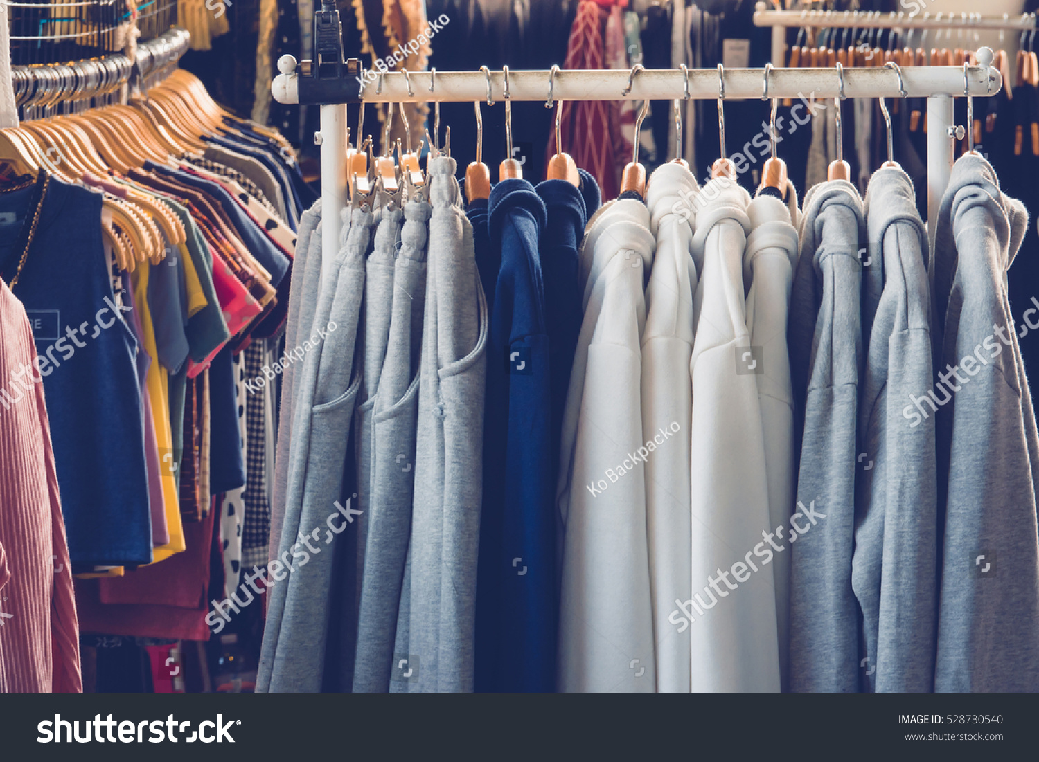 Sweaters on a Clothes Rack